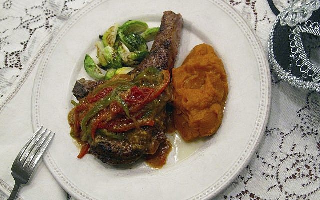 Illustrative: A spicy pork chop with Creole mustard sauce, January 23, 2017. (Sara Moulton via AP) Illustrative: A spicy pork chop with Creole mustard sauce, January 23, 2017. (Sara Moulton via AP)