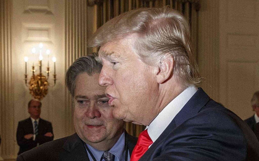 US President Donald Trump and then-White House chief strategist Steve Bannon are seen in the State Dining Room of the White House, February 3, 2017 (AP Photo/Evan Vucci) US President Donald Trump and then-White House chief strategist Steve Bannon are seen in the State Dining Room of the White House, February 3, 2017 (AP Photo/Evan Vucci)