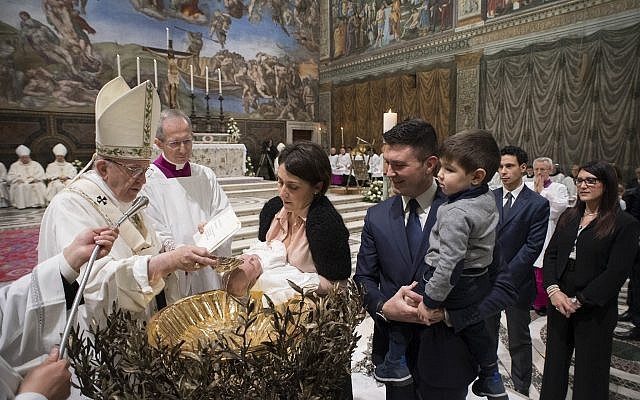 Pope Francis baptizes a child at the Vatican, January 7, 2018. (L'Osservatore Romano/Pool Photo via AP) Pope Francis baptizes a child at the Vatican, January 7, 2018. (L'Osservatore Romano/Pool Photo via AP)