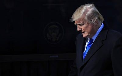 President Donald Trump walks to the podium to address participants of the annual March for Life event, in the Rose Garden of the White House in Washington, Friday, Jan. 19, 2018. (AP Photo/Manuel Balce Ceneta)