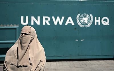 Illustrative: A Palestinian woman outside the UN Relief and Works Agency (UNRWA) headquarters in Gaza City, August 16, 2015. (AP Photo/Khalil Hamra/File)