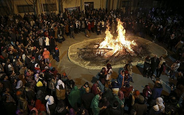 Iranian Zoroastrians gather around a giant bonfire in a ceremony celebrating their ancient mid-winter Sadeh festival in Tehran, Iran, Friday, January 30, 2015. (AP/Vahid Salemi) Iranian Zoroastrians gather around a giant bonfire in a ceremony celebrating their ancient mid-winter Sadeh festival in Tehran, Iran, Friday, January 30, 2015. (AP/Vahid Salemi)