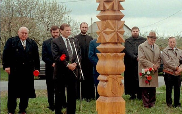 Sandor Lezsak, 3rd left, delivers his speech during the inauguration of a wooden memorial at Nyirpazony, Sunday, 19 April, 1998, for the memory of Briton Michael Trevor Pollard. (AP/SandorBarna) Sandor Lezsak, 3rd left, delivers his speech during the inauguration of a wooden memorial at Nyirpazony, Sunday, 19 April, 1998, for the memory of Briton Michael Trevor Pollard. (AP/SandorBarna)