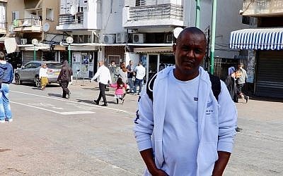 Actvist Bluts Iyassu Zeru in south Tel Aviv on January 13, 2018, prior to a weekly meeting of Eritreans United for Justice, an opposition group dedicated to uniting diaspora Eritreans in order to overthrow the Eritrean dictator. (Melanie Lidman/Times of Israel)