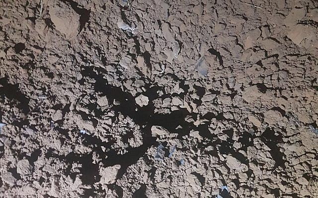 The remains of a rocket that was fired at the Eshkol region of southern Israel by terrorists in the Gaza Strip on January 1, 2018. (Eshkol Regional Council) The remains of a rocket that was fired at the Eshkol region of southern Israel by terrorists in the Gaza Strip on January 1, 2018. (Eshkol Regional Council)