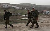 IDF soldiers patrol the Gilad Farm illegal West Bank settlement outpost on December 2, 2009. (Kobi Gideon/Flash90)