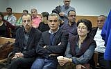 Former Balad party MKs Hanin Zoabi, right, and Jamal Zahalka, center, both of the Joint (Arab) List Faction, seen at the court hearing of fellow faction member MK Basel Ghattas at the Rehovot Magistrate's Court, January 5, 2017. (Avi Dishi/Flash90)