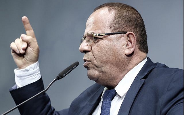 Communications Minister Ayoub Kara speaks at a Likud party event in Lod on December 31, 2017. (Tomer Neuberg/Flash90) Communications Minister Ayoub Kara speaks at a Likud party event in Lod on December 31, 2017. (Tomer Neuberg/Flash90)