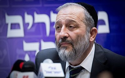 Leader of the Shas party Interior Minister Aryeh Deri leads a party faction meeting at the Knesset, January 01, 2018. (Miriam Alster/Flash90)