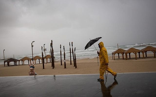 The beach in Tel Aviv on a stormy winter day in Tel Aviv, January 5, 2018. (Miriam Alster/Flash90) The beach in Tel Aviv on a stormy winter day in Tel Aviv, January 5, 2018. (Miriam Alster/Flash90)