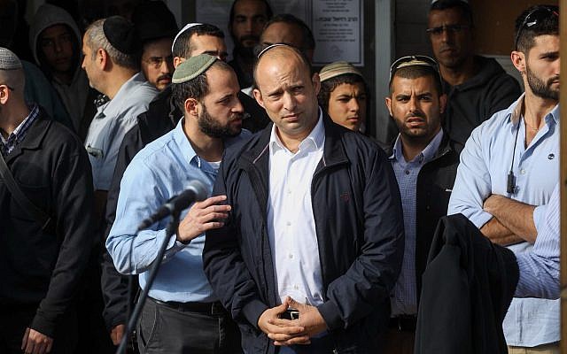 Education Minister Naftali Bennett attends the funeral of Rabbi Raziel Shevah, 35, in the West Bank outpost of Havat Gilad on January 10, 2018. (Miriam Alster/Flash90) Education Minister Naftali Bennett attends the funeral of Rabbi Raziel Shevah, 35, in the West Bank outpost of Havat Gilad on January 10, 2018. (Miriam Alster/Flash90)