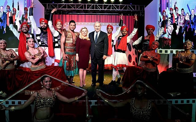 Prime Minister Benjamin Netanyahu and his wife Sara attend a gathering of Bollywood stars in Mumbai, India, on January 18, 2018. (Avi Ohayon/GPO) Prime Minister Benjamin Netanyahu and his wife Sara attend a gathering of Bollywood stars in Mumbai, India, on January 18, 2018. (Avi Ohayon/GPO)