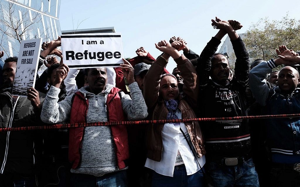 African asylum seekers and human rights activists protest against deportation in front of the Rwandan Embassy in Herzliya, on January 22, 2018. (Tomer Neuberg/Flash90) African asylum seekers and human rights activists protest against deportation in front of the Rwandan Embassy in Herzliya, on January 22, 2018. (Tomer Neuberg/Flash90)