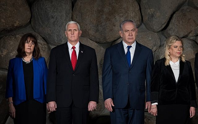 US Vice President Mike Pence, 2nd left, and his wife Karen, left, with Prime Minister Benjamin Netanyahu, 2nd right, and his wife Sara during a ceremony at the remembrance hall at the Yad Vashem Holocaust Memorial Museum in Jerusalem, on January 23, 2018. (Noam Revkin Fenton/Yad Vashem) US Vice President Mike Pence, 2nd left, and his wife Karen, left, with Prime Minister Benjamin Netanyahu, 2nd right, and his wife Sara during a ceremony at the remembrance hall at the Yad Vashem Holocaust Memorial Museum in Jerusalem, on January 23, 2018. (Noam Revkin Fenton/Yad Vashem)