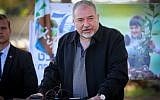 Defense Minister Avigdor Liberman during a ceremony for the Jewish holiday of Tu Bishvat in Kibbutz Kfar Aza, in southern Israel, January 31, 2018. (Flash90)