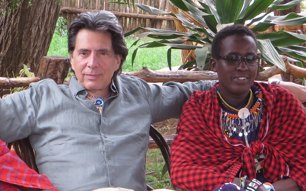 Eric Young with his Maasai 'brother' Nelson Ole Reiyia. (Courtesy)