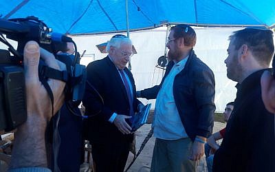 US Ambassador David Friedman (L) pays a condolence call at the home of Likud MK Yehudah Glick in the West Bank settlement of Otniel on January 3, 2018. (Courtesy Har Hebron Regional Council)
