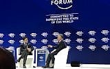 Jordan's King Abdullah (R) speaks with CNN's Fareed Zakaria at the World Economic Forum in Davos, Switzerland, on January 24, 2018. (Jacob Magid/Times of Israel)