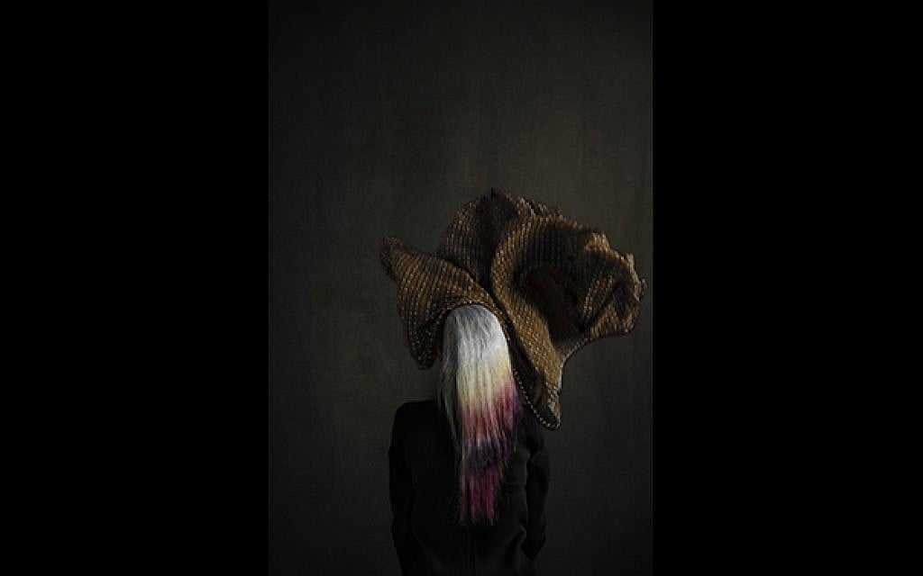 'I always suffered from compulsory hijab. I always long to feel the wind in my hair. The burden is beyond imagination, but it is just the tip of the iceberg.'  (© Marinka Masséus)