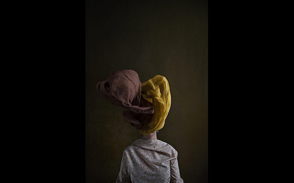'After the government repressed the Green Movement in 2009, many of the young people have given up hope. But I haven’t. When I look around in the streets and see the bright colors, the girls wearing the hijabs so low with strands of hair showing, I see hope. I see change.' (© Marinka Masséus)
