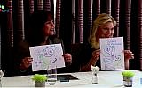 US Second Lady Karen Pence (left) and Sara Netanyahu hold up drawings during a session with art therapists in Jerusalem on January 22, 2018. (Screen capture/YouTube)