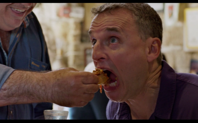 Dr. Shakshuka feeds Phil Rosenthal in 'Somebody Feed Phil.' (Netflix)