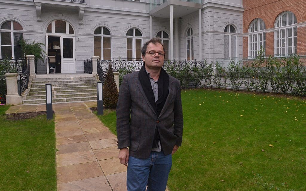 Stephan Templ outside a building in Vienna which he claimed from the Austrian state, October 27, 2014. (Cnaan Liphshiz/JTA) Stephan Templ outside a building in Vienna which he claimed from the Austrian state, October 27, 2014. (Cnaan Liphshiz/JTA)