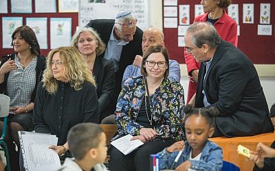 Finnish educator Marja-Kristiina (second from right) and ICEI director Don Futterman in an Israeli classroom. (Courtesy Ilan Spira)