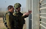 The head of the Southern Gaza Brigade, Col. Kobi Heller, right, and IDF Southern Command chief Maj. Gen. Eyal Zamir visit the Kerem Shalom Crossing on January 14, 2018, where an alleged Hamas attack tunnel was discovered and destroyed by the military the day before. (Israel Defense Forces)