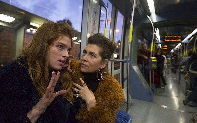 Yuval Sherf (left) and Keren Mor on the train in 'Jerusalem Light Rail' (Courtesy Amos Gitai) Yuval Sherf (left) and Keren Mor on the train in 'Jerusalem Light Rail' (Courtesy Amos Gitai)
