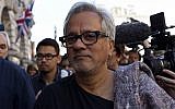 Anish Kapoor walking in a march in London in solidarity with migrants currently crossing Europe, Sept. 17, 2015. (Ben Pruchnie/Getty Images via JTA)