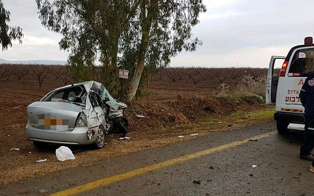 The crumpled passenger car whose driver was killed after a collision with a police patrol car in northern Israel, January 17, 2018. (Magen David Adom) The crumpled passenger car whose driver was killed after a collision with a police patrol car in northern Israel, January 17, 2018. (Magen David Adom)