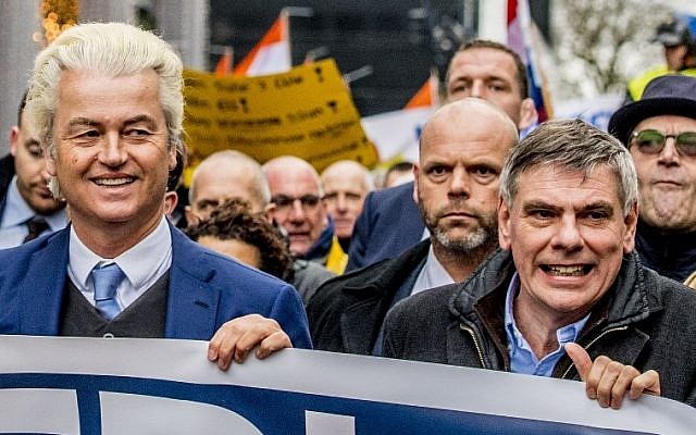 Dutch far-right politician Geert Wilders of the PVV party (L), and Belgium's Vlaams Belang Flemish right-wing party leader Filip De Winter lead a protest march against the policy of Dutch Prime Minister and his cabinet in Rotterdam, on January 20, 2018. (AFP PHOTO / ANP / Robin UTRECHT / Netherlands OUT) Dutch far-right politician Geert Wilders of the PVV party (L), and Belgium's Vlaams Belang Flemish right-wing party leader Filip De Winter lead a protest march against the policy of Dutch Prime Minister and his cabinet in Rotterdam, on January 20, 2018. (AFP PHOTO / ANP / Robin UTRECHT / Netherlands OUT)