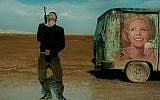 An Israeli soldier does a mock dance with his rifle in “Foxtrot.” (Sony Pictures Classics)