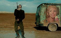 An Israeli soldier does a mock dance with his rifle in “Foxtrot.” (Sony Pictures Classics)