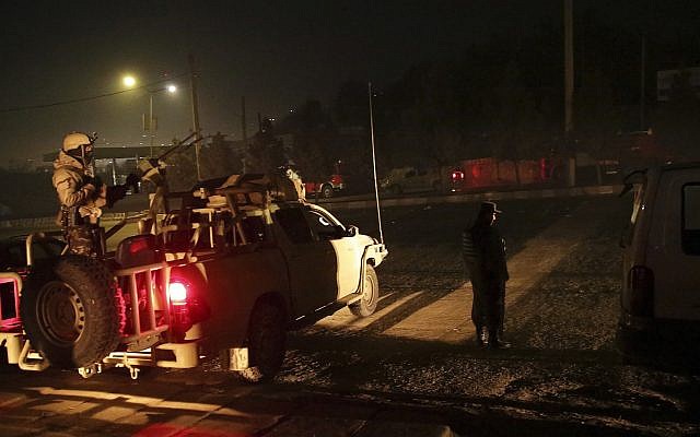 Security forces stand guard near the Intercontinental Hotel after a deadly attack in Kabul, Afghanistan, January 20, 2018. (AP Photo/Massoud Hossaini) Security forces stand guard near the Intercontinental Hotel after a deadly attack in Kabul, Afghanistan, January 20, 2018. (AP Photo/Massoud Hossaini)