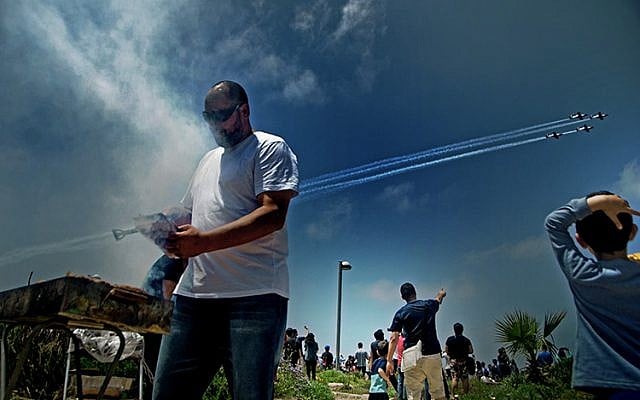 Gotta make sure the grilled meat will be ready for the Yom Haatzmaut barbecue (Courtesy Shiran Rokvan)