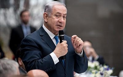 Prime Minister Benjamin Netanyahu addresses a lunch meeting at the 54th Munich Security Conference on February 16, 2018. (AFP Photo/ DPA/Sven Hoppe)