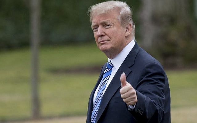 US President Donald Trump gives a thumbs-up as he walks to Marine One prior to departure from the South Lawn of the White House in Washington, DC, February 16, 2018, as he travels to Florida for the weekend. ( AFP PHOTO / SAUL LOEB) US President Donald Trump gives a thumbs-up as he walks to Marine One prior to departure from the South Lawn of the White House in Washington, DC, February 16, 2018, as he travels to Florida for the weekend. ( AFP PHOTO / SAUL LOEB)