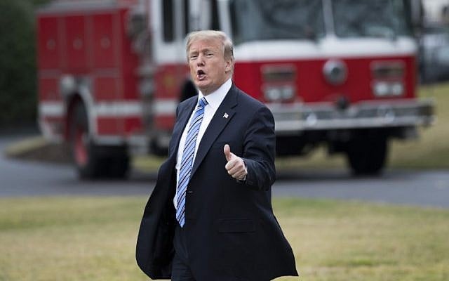 US President Donald Trump gives a thumbs-up as he walks to board Marine One on the South Lawn of the White House in on February 16, 2018. (AFP Photo/Saul Loeb) US President Donald Trump gives a thumbs-up as he walks to board Marine One on the South Lawn of the White House in on February 16, 2018. (AFP Photo/Saul Loeb)