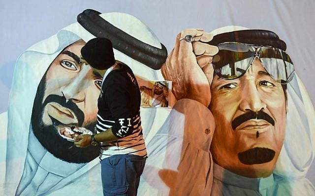 Saudi artists paint a mural portrait of King Salman bin Abdulaziz, right, and his son Crown Prince Mohammed bin Salman, during the 32nd Janadriyah Culture and Heritage Festival, held on the outskirts of the capital Riyadh on February 17, 2018. (AFP/Fayez Nureldine) Saudi artists paint a mural portrait of King Salman bin Abdulaziz, right, and his son Crown Prince Mohammed bin Salman, during the 32nd Janadriyah Culture and Heritage Festival, held on the outskirts of the capital Riyadh on February 17, 2018. (AFP/Fayez Nureldine)