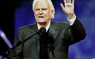 In this file photo taken on June 24, 2005 Evangelist Billy Graham delivers his message at the Billy Graham Crusade at Flushing Meadows Park in Flushing Meadows, New York. (AFP PHOTO / Timothy A. CLARY)