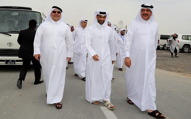 Qatari Minister of Municipality and Environment Mohammad Bin Abdullah Mitaab Al-Rumaihi, right, Secretary-General of the Qatar 2022 Supreme Committee Hassan al-Thawadi, center, and Saad bin Ahmad Al Muhannadi President of the Public Works Authority 'Ashghal attend the inauguration of the Supreme Committee for Delivery & Legacy's Tree Nursery in Doha, on February 22, 2018. (AFP/KARIM JAAFAR) Qatari Minister of Municipality and Environment Mohammad Bin Abdullah Mitaab Al-Rumaihi, right, Secretary-General of the Qatar 2022 Supreme Committee Hassan al-Thawadi, center, and Saad bin Ahmad Al Muhannadi President of the Public Works Authority 'Ashghal attend the inauguration of the Supreme Committee for Delivery & Legacy's Tree Nursery in Doha, on February 22, 2018. (AFP/KARIM JAAFAR)