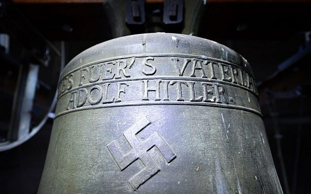 A picture taken on May 19, 2017, shows a Nazi-era church bell that bears a swastika and the words "All for the Fatherland -- Adolf Hitler" ("Alles fuer's Vaterland - Adolf Hitler") hanging in the steeple of the St. Jakob church in Herxheim am Berg, Germany. (AFP Photo/dpa/Uwe Anspach) A picture taken on May 19, 2017, shows a Nazi-era church bell that bears a swastika and the words "All for the Fatherland -- Adolf Hitler" ("Alles fuer's Vaterland - Adolf Hitler") hanging in the steeple of the St. Jakob church in Herxheim am Berg, Germany. (AFP Photo/dpa/Uwe Anspach)