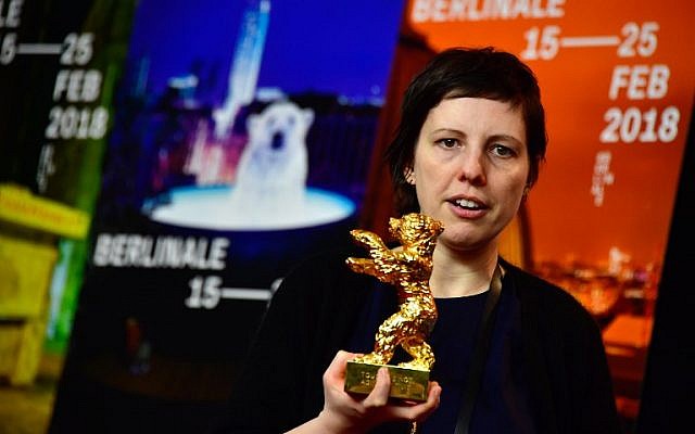 Romanian director Adina Pintilie poses with the Golden Bear for Best Film during a press conference following the awards ceremony of the 68th edition of the Berlinale film festival on February 24, 2018 in Berlin (AFP PHOTO / John MACDOUGALL) Romanian director Adina Pintilie poses with the Golden Bear for Best Film during a press conference following the awards ceremony of the 68th edition of the Berlinale film festival on February 24, 2018 in Berlin (AFP PHOTO / John MACDOUGALL)
