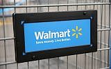 The Walmart logo on a shopping cart at a Walmart store in Chicago, Illinois, 2013 (AFP PHOTO / GETTY IMAGES NORTH AMERICA / SCOTT OLSON)