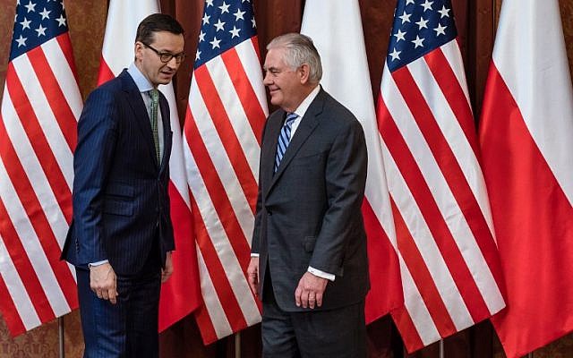 Polish Prime Minister Mateusz Morawiecki (L) poses with US Secretary of State Rex Tillerson in Warsaw on January 27, 2018. (AFP/Wojtek RADWANSKI) Polish Prime Minister Mateusz Morawiecki (L) poses with US Secretary of State Rex Tillerson in Warsaw on January 27, 2018. (AFP/Wojtek RADWANSKI)