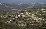 Illustrative: A picture taken from the outskirts of the West Bank city of Nablus shows a view of the illegal outpost of Havat Gilad on February 2, 2018. (AFP Photo/Jaafar Ashtiyeh)