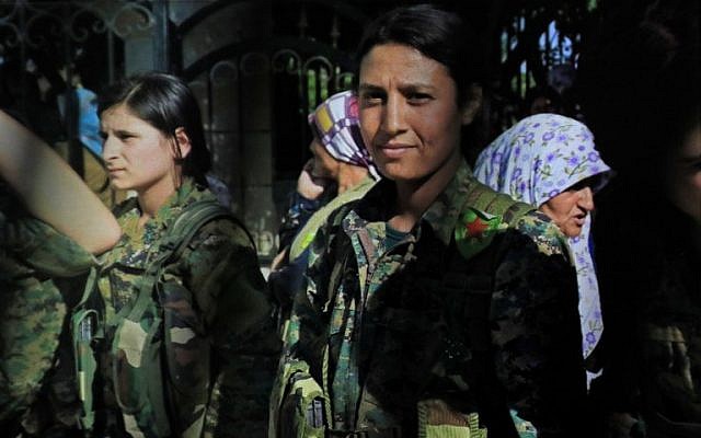 A picture taken on February 2, 2018, in the town of Afrin shows a picture of late 23-year-old YPJ fighter Barin Kobani, displayed on the phone of Amed Kendal, a military commander of the YPJ. (AFP Photo/Delil Souleiman) A picture taken on February 2, 2018, in the town of Afrin shows a picture of late 23-year-old YPJ fighter Barin Kobani, displayed on the phone of Amed Kendal, a military commander of the YPJ. (AFP Photo/Delil Souleiman)