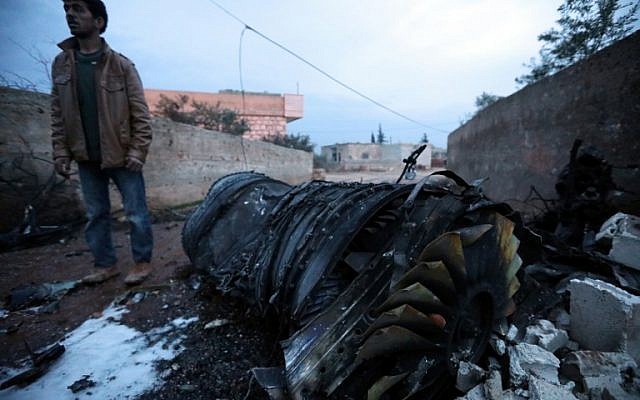 A picture taken on February 3, 2018, shows parts of a downed Sukhoi-25 fighter jet in Syria's northwest province of Idlib. (Omar Haj Kadour/AFP) A picture taken on February 3, 2018, shows parts of a downed Sukhoi-25 fighter jet in Syria's northwest province of Idlib. (Omar Haj Kadour/AFP)